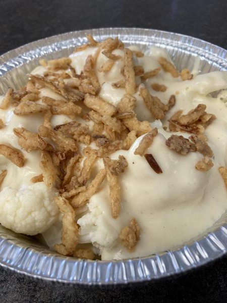 Cauliflower with white cheddar cheese